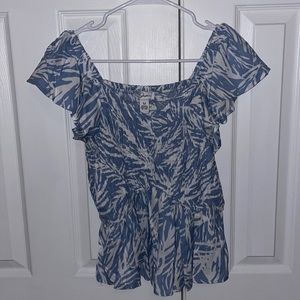 Peplum style tropical print shirt